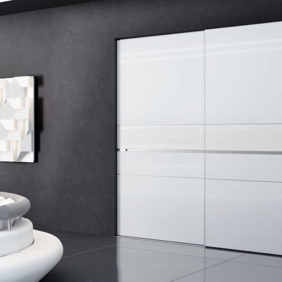 Белый встроенный шкаф-купе с врезными ручками - идеальное решение для вашей прихожей, гостиной или спальни. Прекрасный внешний вид, лаконичное профилирование дверей и высокое качество изготовления делают эту модель непревзойденной. Внутреннее наполнение шкафа ARISTO с пленками и корзинами обеспечивает удобное хранение и предотвращает появление запаха. Габариты мебели могут быть любыми, а цвет ручек и профиля можно выбрать по вашему вкусу. Шкаф-купе NOVA - элегантное и изысканное дополнение для вашего интерьера 3 Гардеробные комнаты на заказ - изготовление и продажа гардеробных, шкафов, дверей шкаф-купе